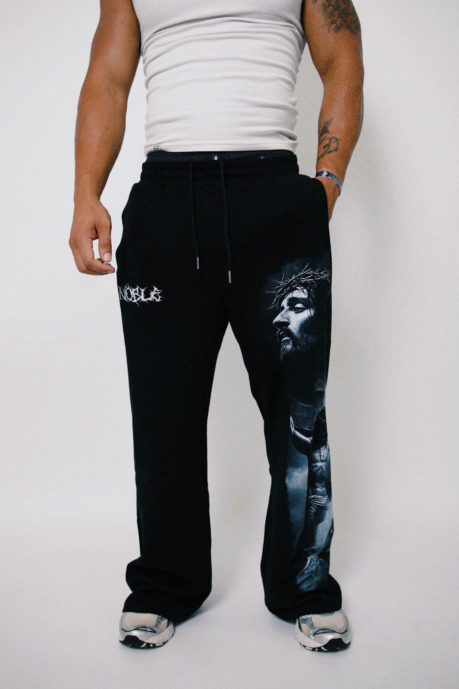 “JESUS LOVES” BAGGY SWEATS