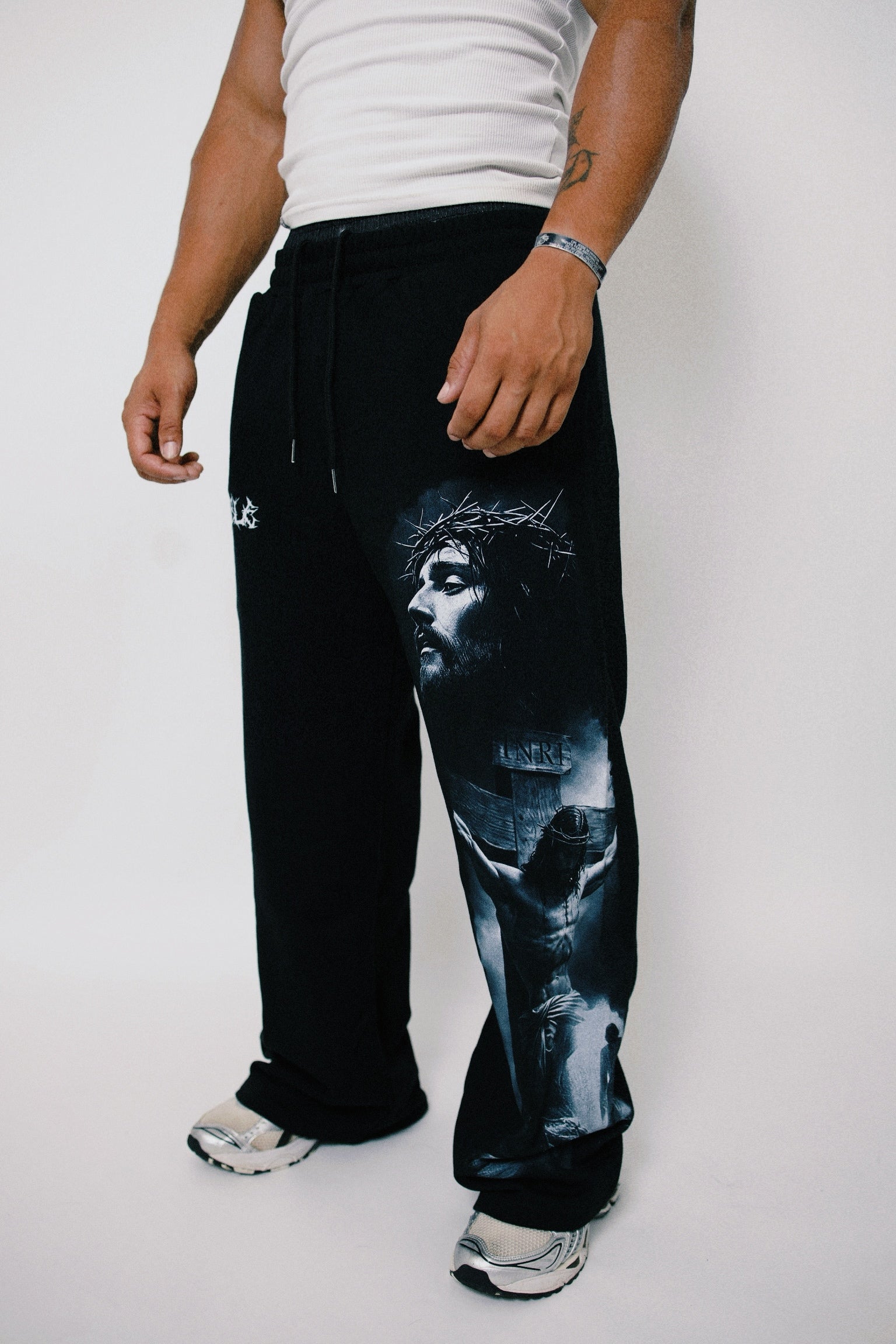 “JESUS LOVES” BAGGY SWEATS