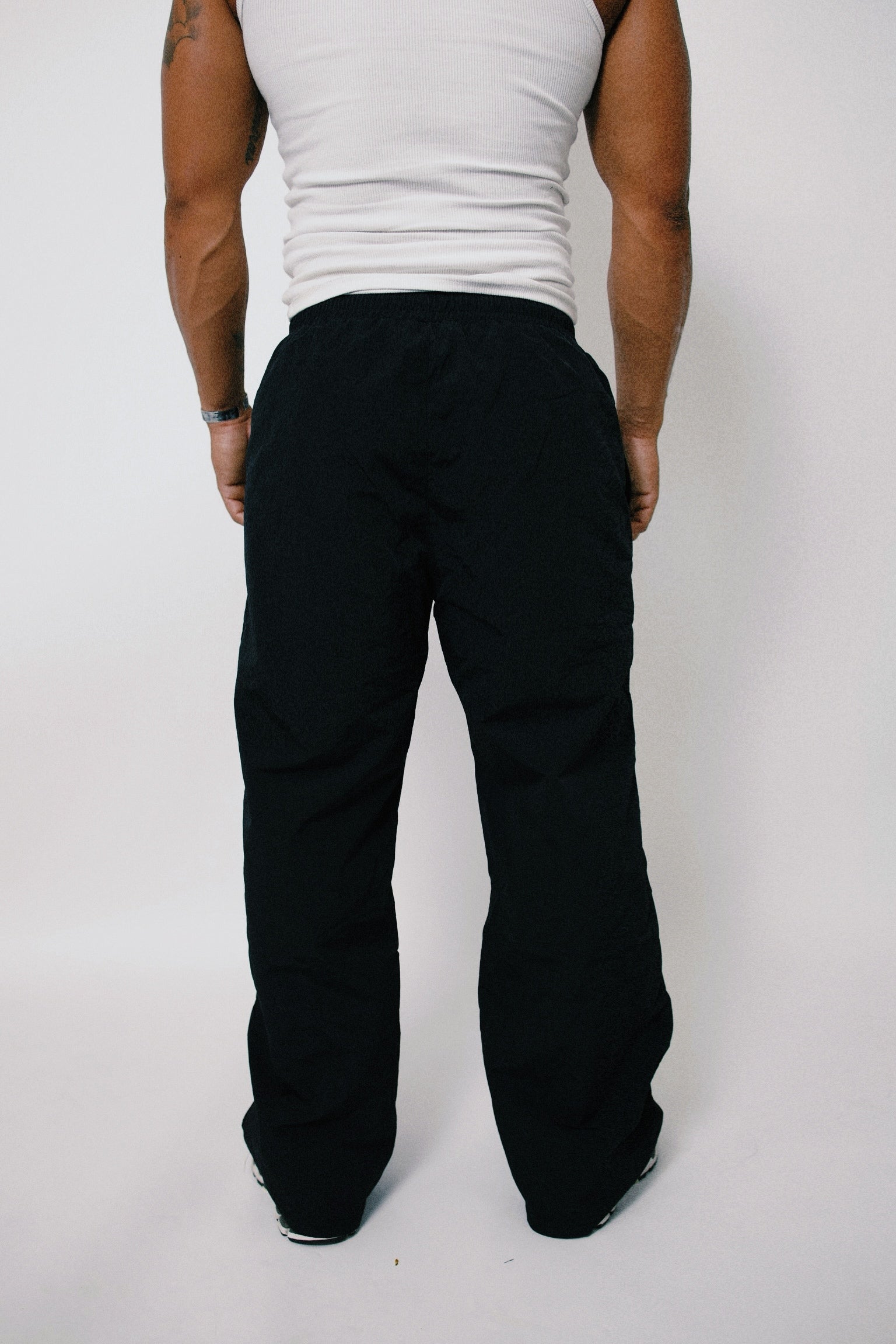 CHRIST IS KING BAGGY TRACK PANTS