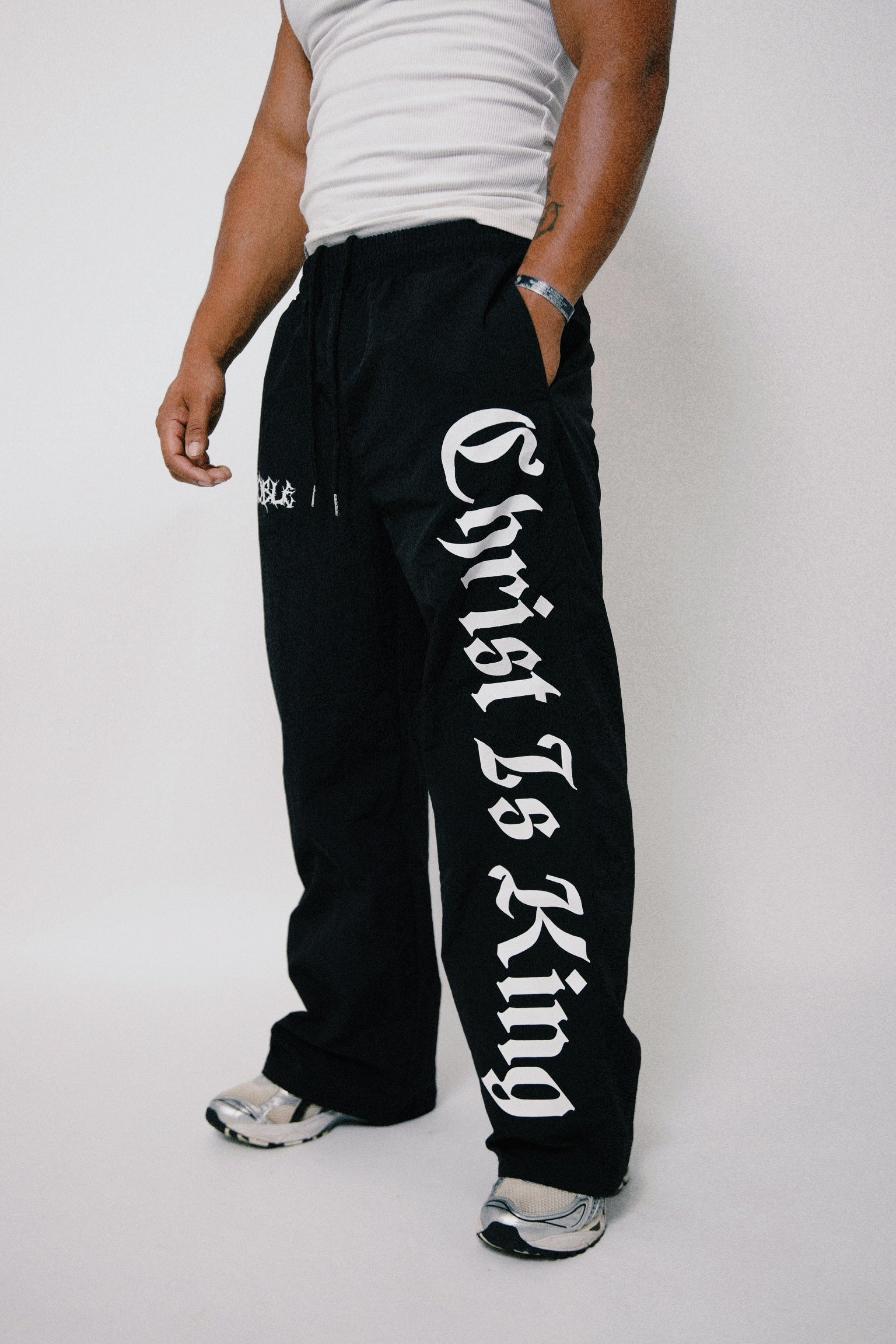 CHRIST IS KING BAGGY TRACK PANTS