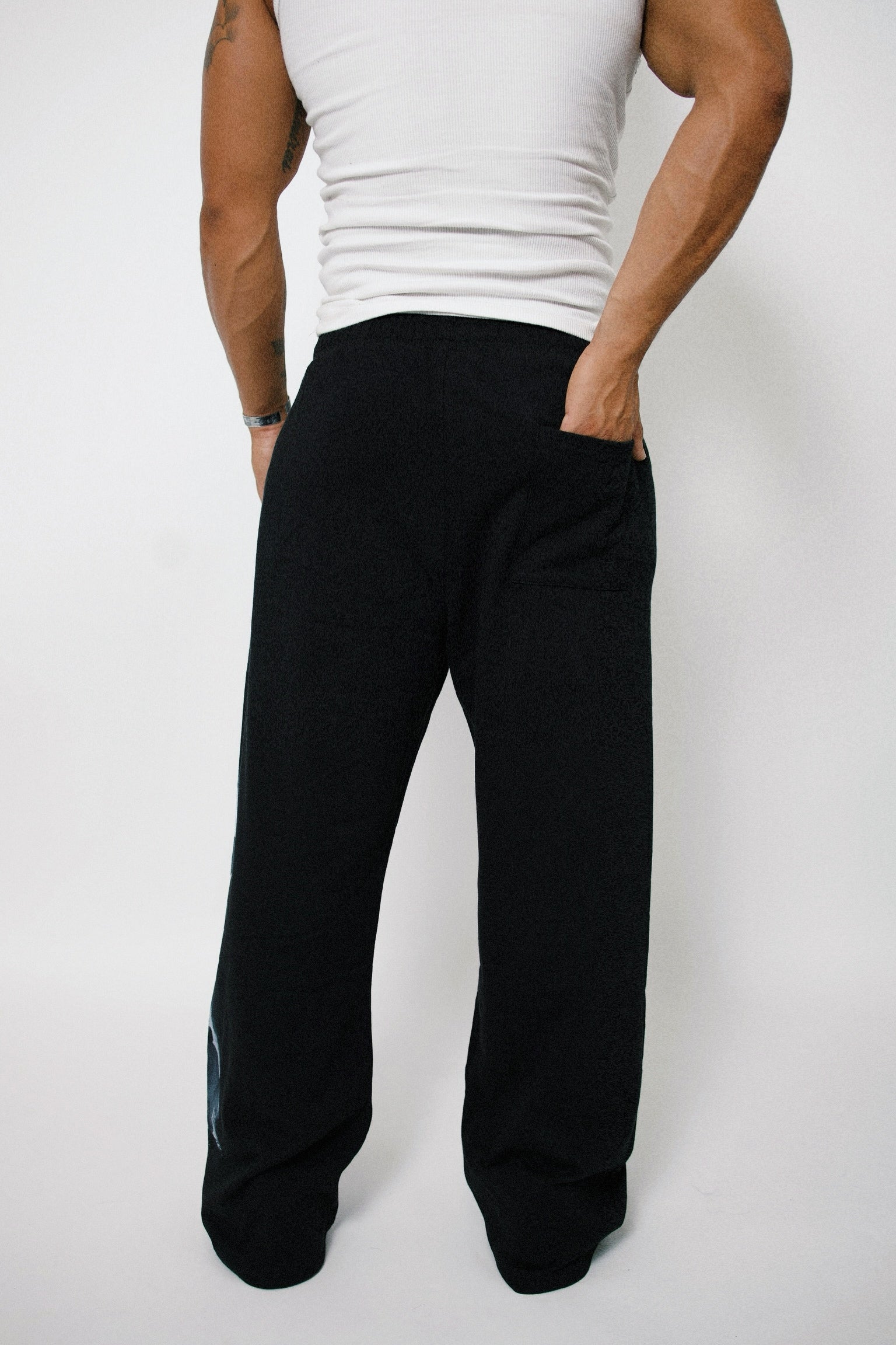 “JESUS LOVES” BAGGY SWEATS